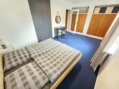 Ein Bett oder Betten in einem Zimmer der Unterkunft Strandnixe 2