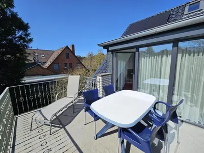 Ein Balkon oder eine Terrasse in der Unterkunft Strandnixe 2