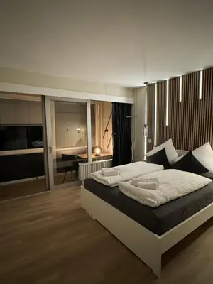 Ein Bett oder Betten in einem Zimmer der Unterkunft Traumhafte Ferienwohnung - direkter Meerblick - 50m zum Strand in Cuxhaven Duhnen in 1A Lage im Haus Seehütte