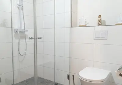 Ein Badezimmer in der Unterkunft Dorumer Sielhuus 7