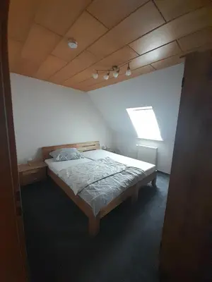 Ein Bett oder Betten in einem Zimmer der Unterkunft Ferienwohnung Stefan Schwiemann