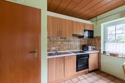 Küche/Küchenzeile in der Unterkunft Haus Am Häfchenweg, Wohnung 1