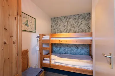Ein Bett oder Betten in einem Zimmer der Unterkunft Haus Elbe 1, Whg 11