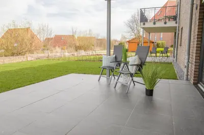 Ein Garten an der Unterkunft Dorumer Sielhuus 4