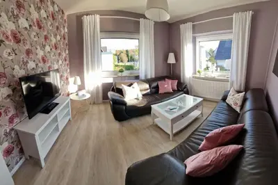 Ein Sitzbereich in der Unterkunft Ferienhaus To Huus