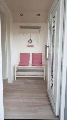 Ein Bett oder Betten in einem Zimmer der Unterkunft Ferienhaus To Huus