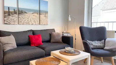 Ein Sitzbereich in der Unterkunft Nige Ooge FeWo 7