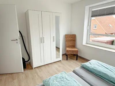 Ein Bett oder Betten in einem Zimmer der Unterkunft Appartement Stader Str 3