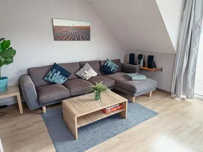 Ein Sitzbereich in der Unterkunft Appartement Stader Str 3