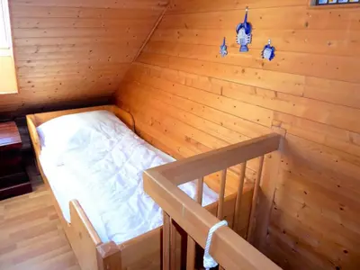 Ein Bett oder Betten in einem Zimmer der Unterkunft Dat Achterschipp