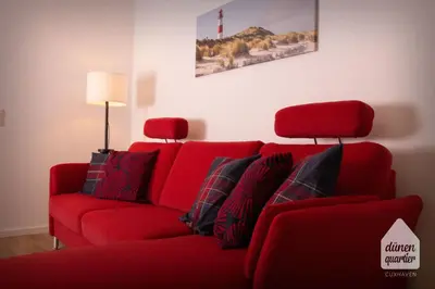 Ein Sitzbereich in der Unterkunft Dünenquartier Cuxhaven
