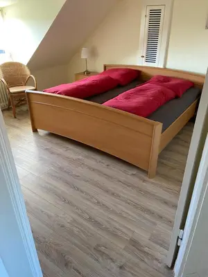 Ein Bett oder Betten in einem Zimmer der Unterkunft Stranddüne