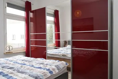 Ein Bett oder Betten in einem Zimmer der Unterkunft Küstenliebe Cuxhaven 2