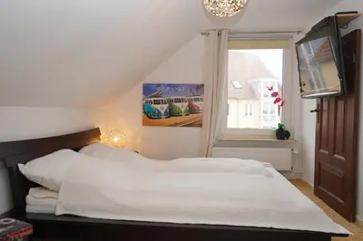 Ein Bett oder Betten in einem Zimmer der Unterkunft Küstenliebe Cuxhaven 3