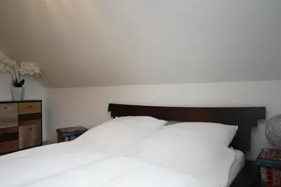 Ein Bett oder Betten in einem Zimmer der Unterkunft Küstenliebe Cuxhaven 3