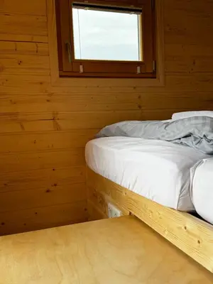 Ein Bett oder Betten in einem Zimmer der Unterkunft Strandgut Kajüte