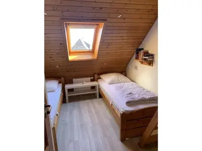 Ein Bett oder Betten in einem Zimmer der Unterkunft Blauort in Friedrichskoog-Spitze