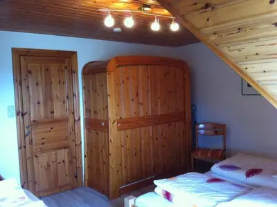 Ein Bett oder Betten in einem Zimmer der Unterkunft Blauort in Friedrichskoog-Spitze
