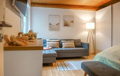 Ein Sitzbereich in der Unterkunft 3 Bedroom Gorgeous Home In Otterndorf