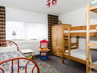 Ein Bett oder Betten in einem Zimmer der Unterkunft Apartment 2 holiday home Speckert