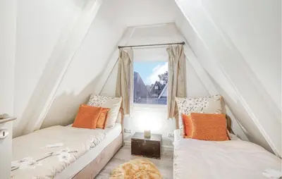 Ein Bett oder Betten in einem Zimmer der Unterkunft Stunning Home In Friedrichskoog