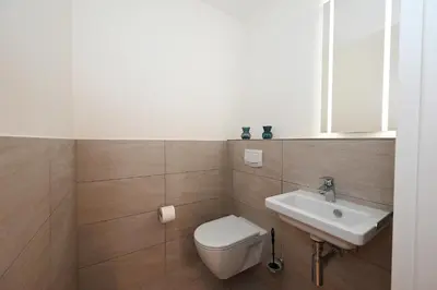 Ein Badezimmer in der Unterkunft Diekleev