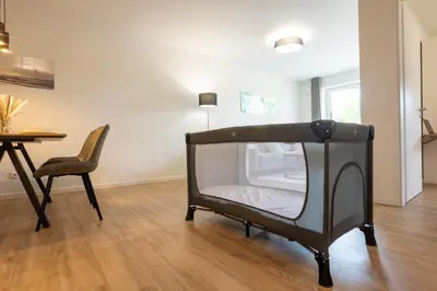 Ein Bett oder Betten in einem Zimmer der Unterkunft Dorumer Seestern - Dorumer Sielhuus 3