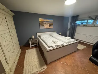 Ein Bett oder Betten in einem Zimmer der Unterkunft Wellness-Ferienwohnung Strandperle
