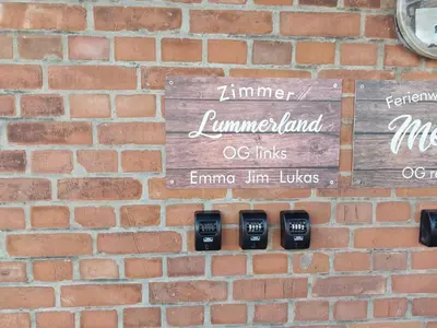 Ein Zertifikat, Auszeichnung, Logo oder anderes Dokument, das in der Unterkunft Zimmer Lummerland ausgestellt ist