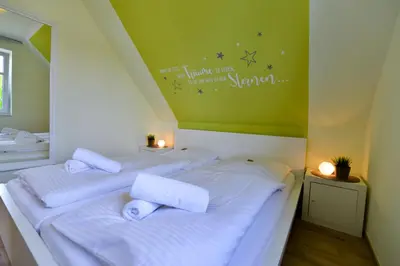 Ein Bett oder Betten in einem Zimmer der Unterkunft Flockengrund B86B
