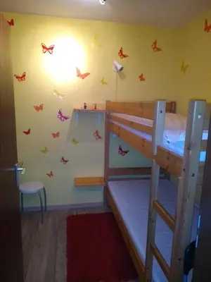 Ein Bett oder Betten in einem Zimmer der Unterkunft Nordsee-Oase