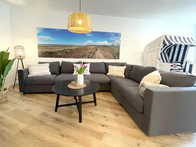 Ein Sitzbereich in der Unterkunft Haus Nordseebrandung FeWo 8