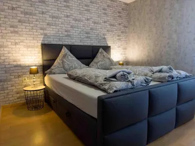 Ein Bett oder Betten in einem Zimmer der Unterkunft Haus Sonneneck 1