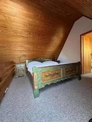 Ein Bett oder Betten in einem Zimmer der Unterkunft Kampweg 1 Wohnung 2