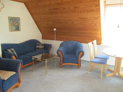 Ein Sitzbereich in der Unterkunft Kampweg 1 Wohnung 1