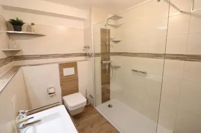 Ein Badezimmer in der Unterkunft Haus Nordseebrandung Wohnung B64