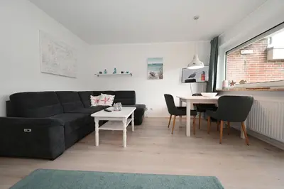 Ein Sitzbereich in der Unterkunft Nordseestube