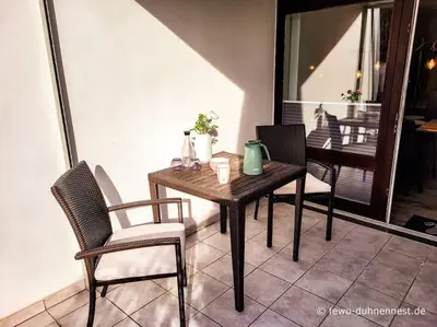 Ein Sitzbereich in der Unterkunft Ferienwohnung Duhnennest in Cuxhaven Duhnen
