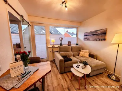 Ein Sitzbereich in der Unterkunft Ferienwohnung Duhnenzauber in Cuxhaven Duhnen