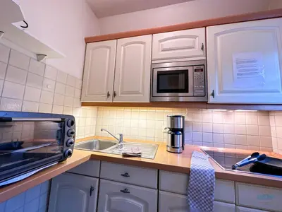 Küche/Küchenzeile in der Unterkunft Ferienhaus Blinkfüür Duhnen