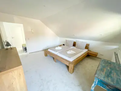 Ein Bett oder Betten in einem Zimmer der Unterkunft Ferienhaus Lindenweg Bad Bederkesa