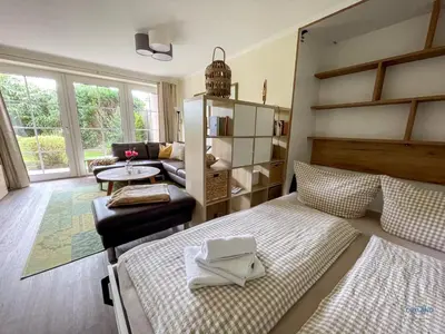Ein Bett oder Betten in einem Zimmer der Unterkunft Landhaus Rosenhof Wohnung 1