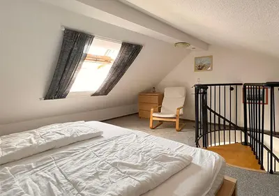 Ein Bett oder Betten in einem Zimmer der Unterkunft Ferienwohnung Deichbrise