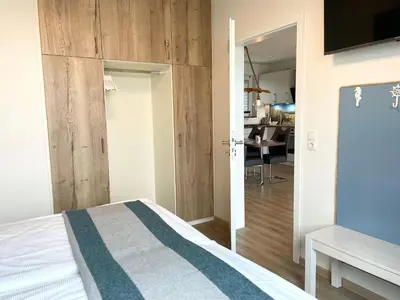 Ein Bett oder Betten in einem Zimmer der Unterkunft Haus Wernerwald FeWo 6
