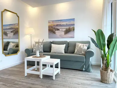 Ein Sitzbereich in der Unterkunft Haus Nordseebrandung FeWo 3