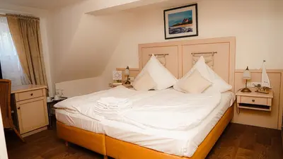 Ein Bett oder Betten in einem Zimmer der Unterkunft Zur-Erholung Büsum