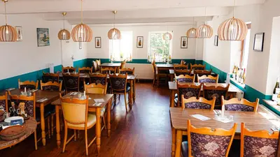 Ein Restaurant oder anderes Speiselokal in der Unterkunft Zur-Erholung Büsum