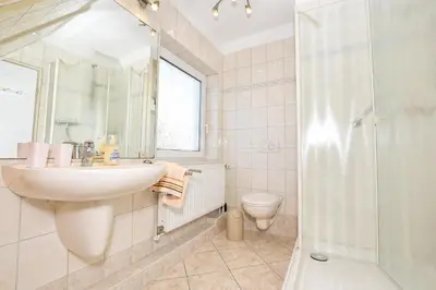 Ein Badezimmer in der Unterkunft Haus Birte