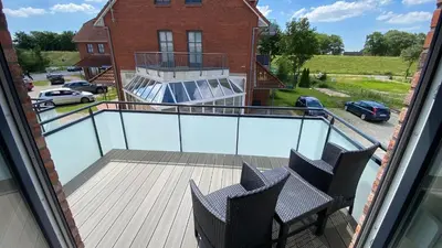 Ein Balkon oder eine Terrasse in der Unterkunft FRI75 Luise App4