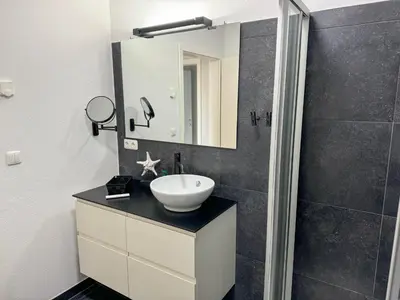 Ein Badezimmer in der Unterkunft Haus Seehafen Apartment 2 3